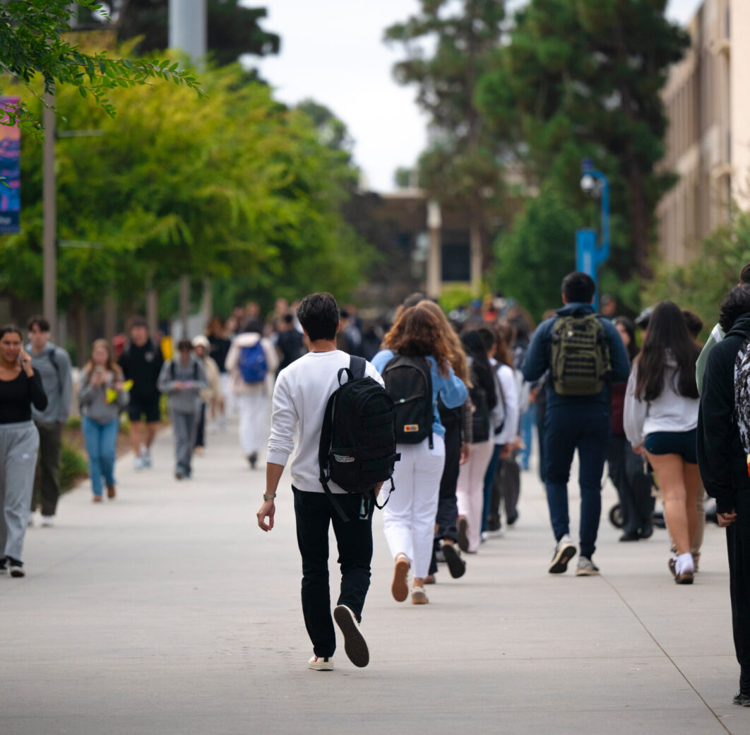 Photo of students walking on campus