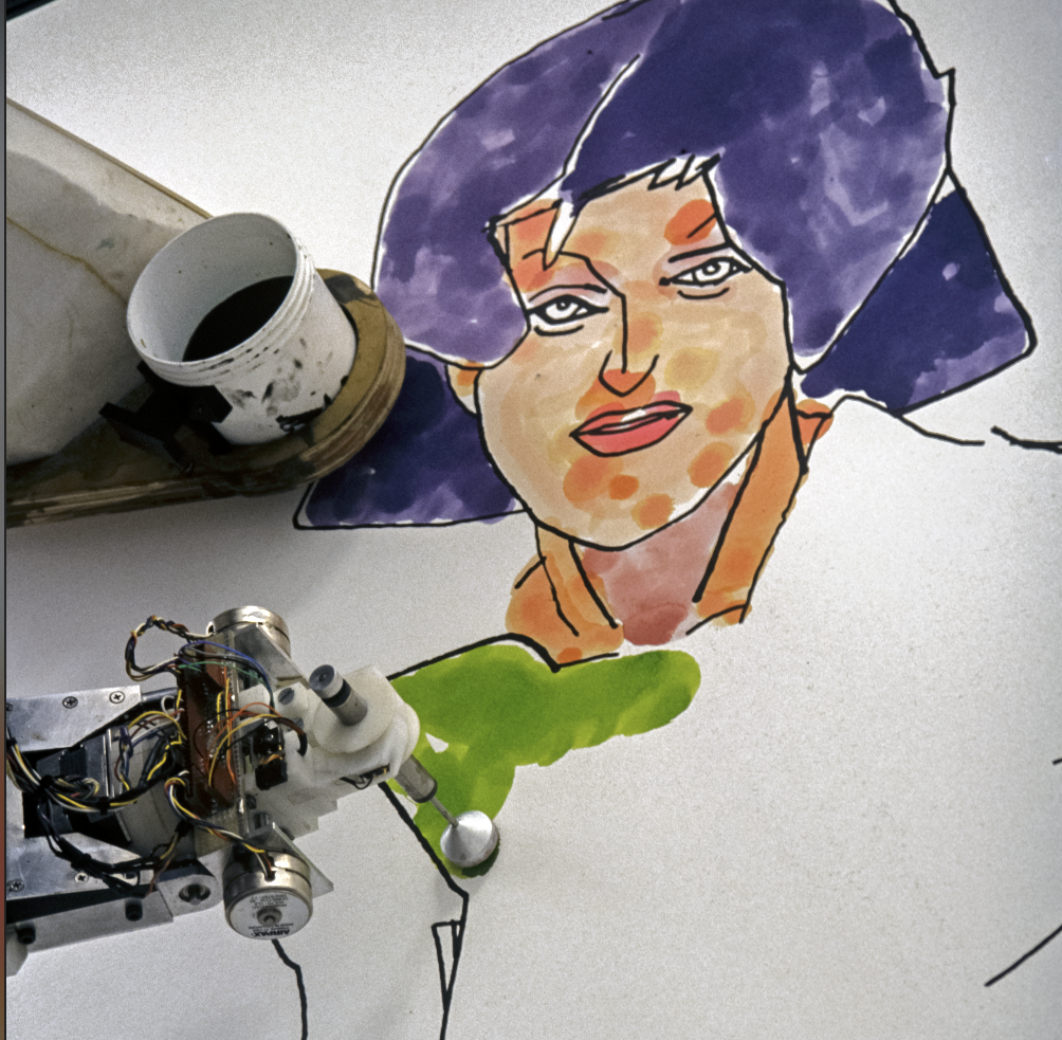 An automated device shown adding color to a piece of artwork created entirely by AI