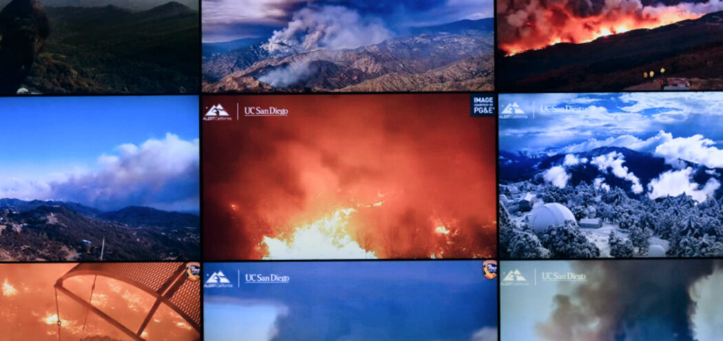 Wall of tv screens showing various climate issues